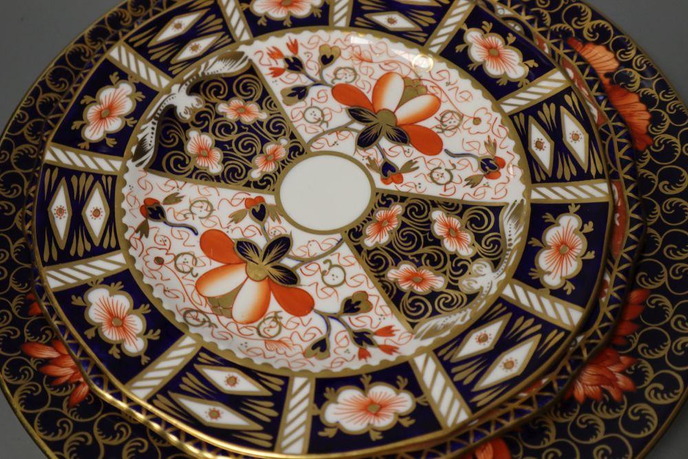 Six Royal Crown Derby imari plates including one Kings pattern and five 1128 pattern trays, 27cm